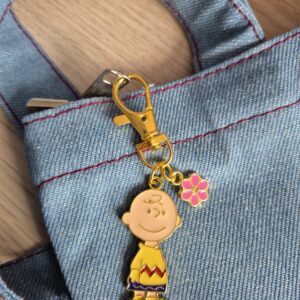 Charlie Brown Metal Keychain with Pink Charm – Classic & Fun Accessory